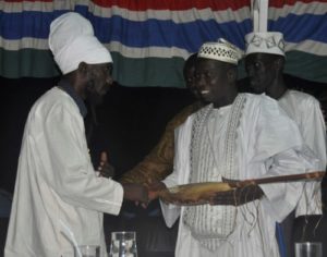 Sizzla Kalonji receives Halam musical instrument form Kora master at Gala Awards in Banjul, The Gambia Photo Credit: Sharon Parris-Chambers