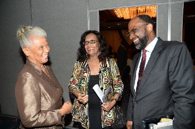 Hon. Dorothy Pine-McClarty (centre) , recipient of the Methodist Church 2014 Biennial Award, with Glenn Lee, chairman of the FirstCaribbean Unsung Heroes Local Committee, and Earl Jarrett, general manager of Jamaica National Building Society.