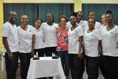 Front Row –Left to Right -Dudley Malcolm, Sharon Parris-Chambers, Shawnette Montaque, Audrey Bennett, Center-Patricia Berry Greenidge, Verona Warburton, Charisse Pink & Marny Daley. Back Row: Left to Right –Lance Rose, Sanatta McLeggon and Janice McLeod.