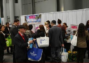 Travel agents flock Jamaica Tourist Board Booth at the New York Times Travel Show