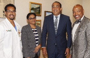 Dr. Chad R. Ritch, Dr. Jacquiline Bisasor-Mckenzie, Dr. Christopher Tufton, and Dean Henri R. Ford. as Jamaican Minister of Health visits Univ. of Miami Health System