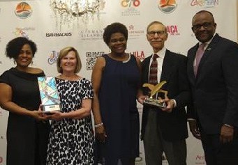 Deputy Director of Tourism-Marketing, Camile Glenister; Cheryl Andrews, recipient of the Marcella Martinez Award; Jennifer Griffith, Permanent Secretary in the Ministry of Tourism; Ed Wetschler recipient of the Marcia Vickery-Wallace Award, and Jamaica’s Director of Tourism Donovan White.