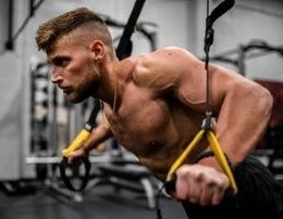 Adding More Muscle To Your Body by lifting heavy weights