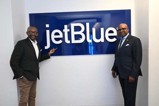 Minister of Tourism, Hon Edmund Bartlett (R) and Director of Tourism, Donovan White at the JetBlue office in New York 