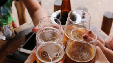 signs that alcohol is your go-to coping mechanism People who are toasting and drinking beer