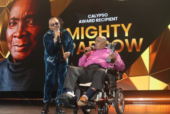 Machel Montano Pays Tribute To Calypso Award Honoree Mighty Sparrow at Caribbean Music Awards