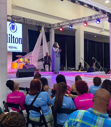 Attendees enjoying a musical performance at Jamaica Bridal Expo.