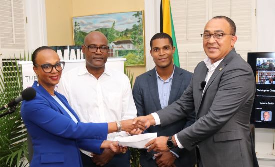 Dr. Jacqueline Watson, Richard Watson, Chad Price and Health and Wellness Minister Dr. Christopher Tufton. Health Clinics in Jamaica