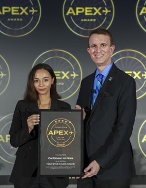 Christina de Sousa Caribbean Airlines Manager, Customer Attention, accepts APEX award