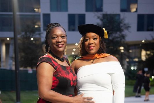 Doctor of Nursing Practice Moya Allen (right) and her mother Tricia Chung